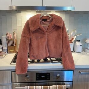 Cropped faux fur coat